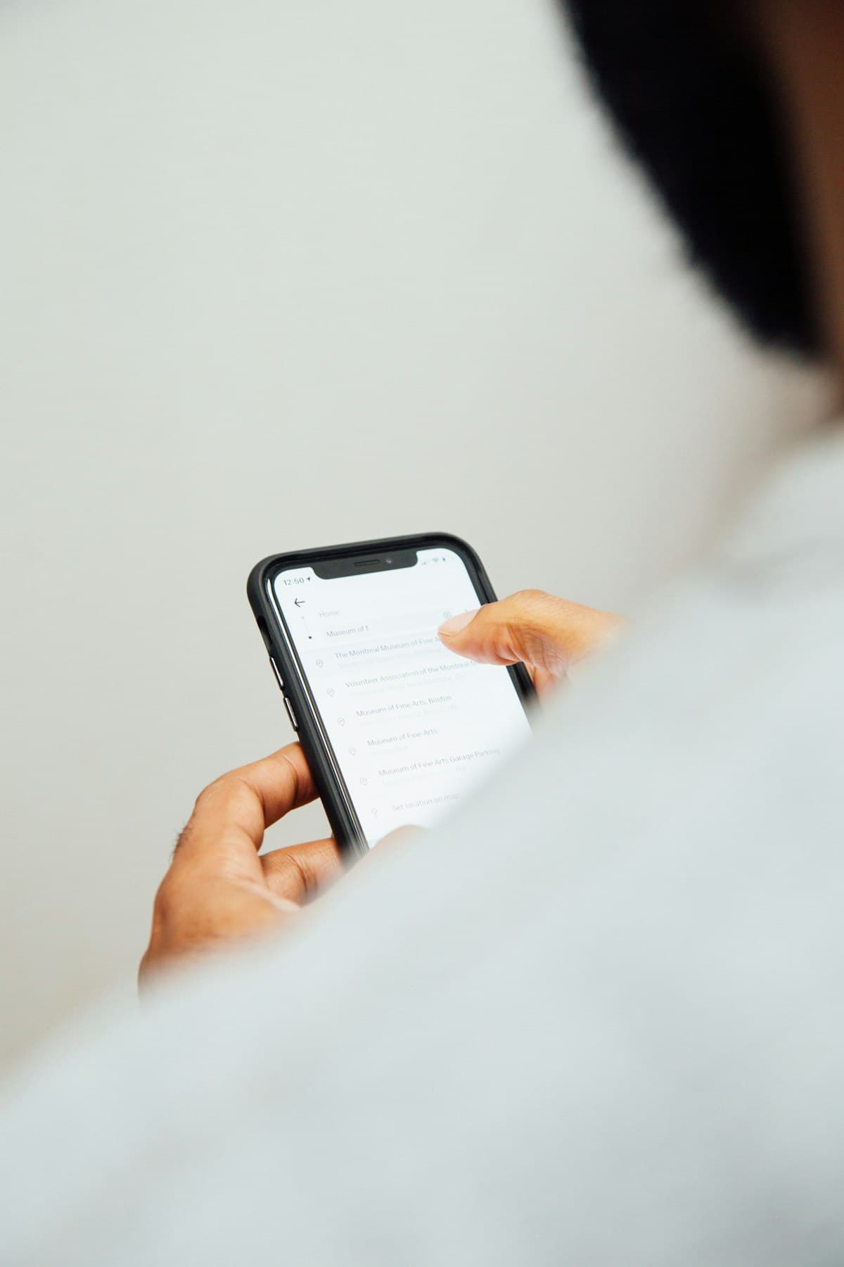 A person pledging a hold from their phone